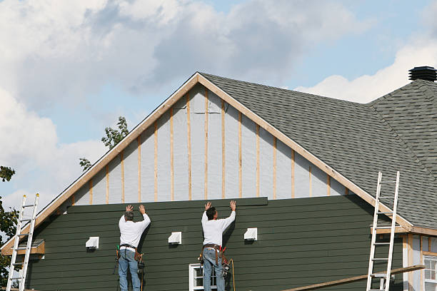 Professional Siding Repair technician working in Hallwood, VA